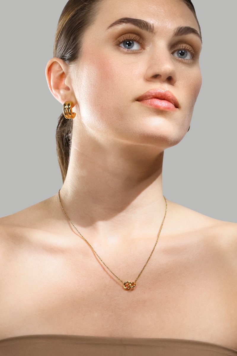 Kolczyk Bold Curve - 18k Pozłacany